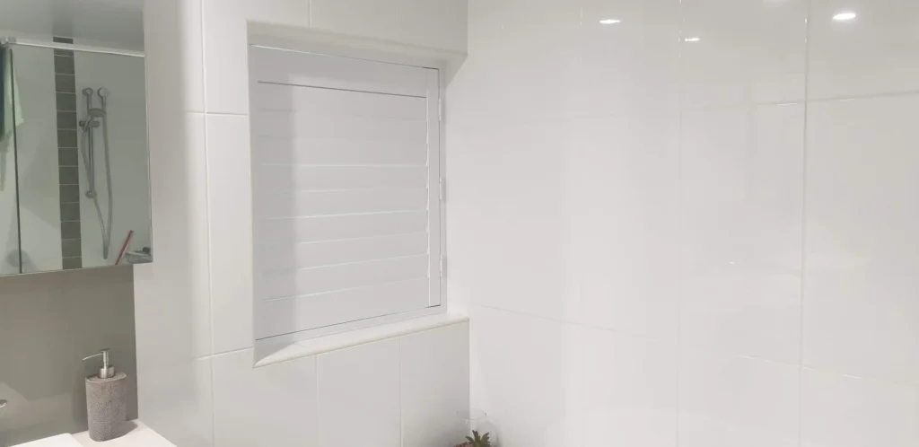 Plantation Shutters installed on bathroom window