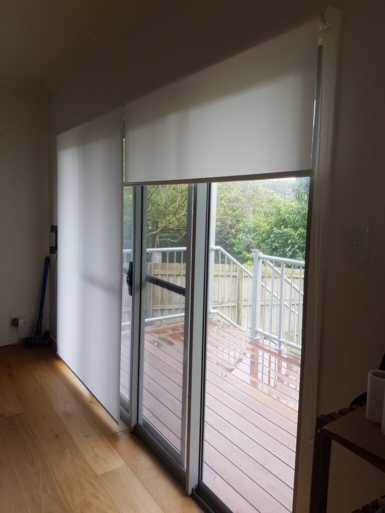 Roller Blinds Inside Covering Sliding Door