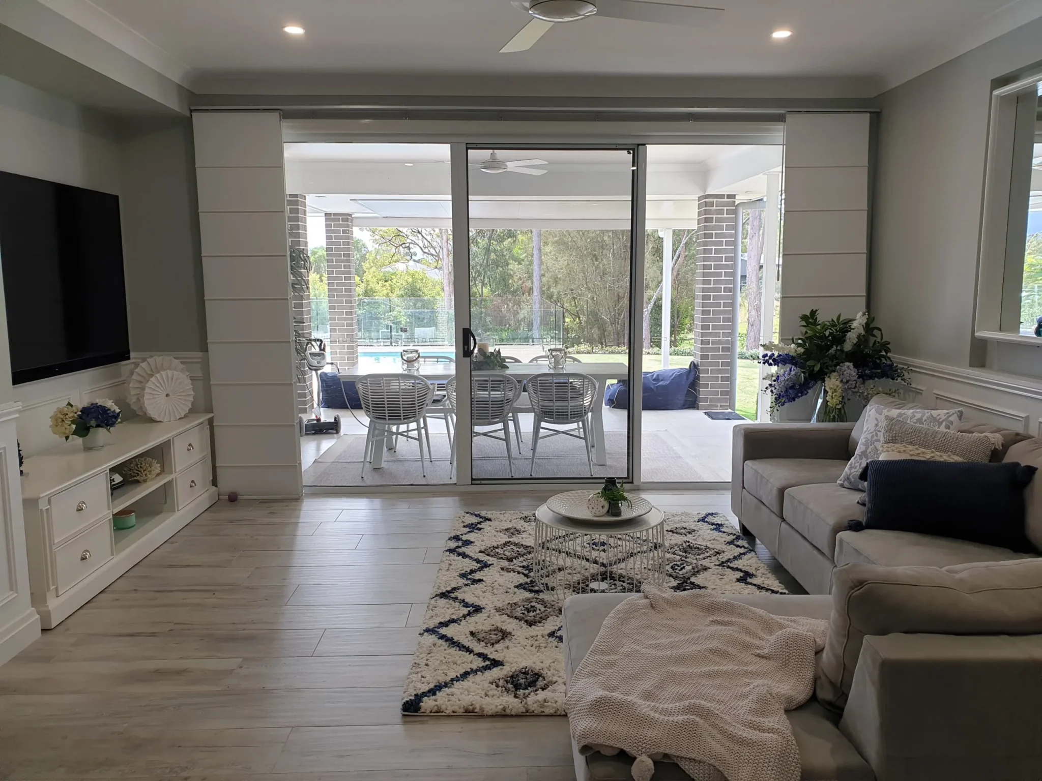 Panel Glide Blinds on sliding door of living room