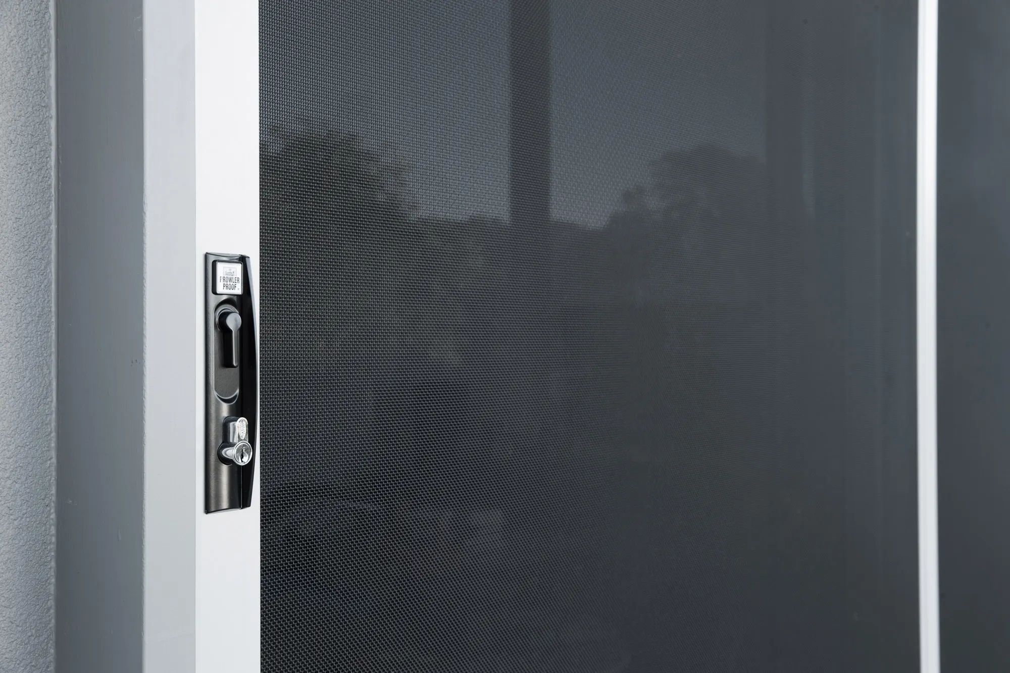 Sliding security mesh door