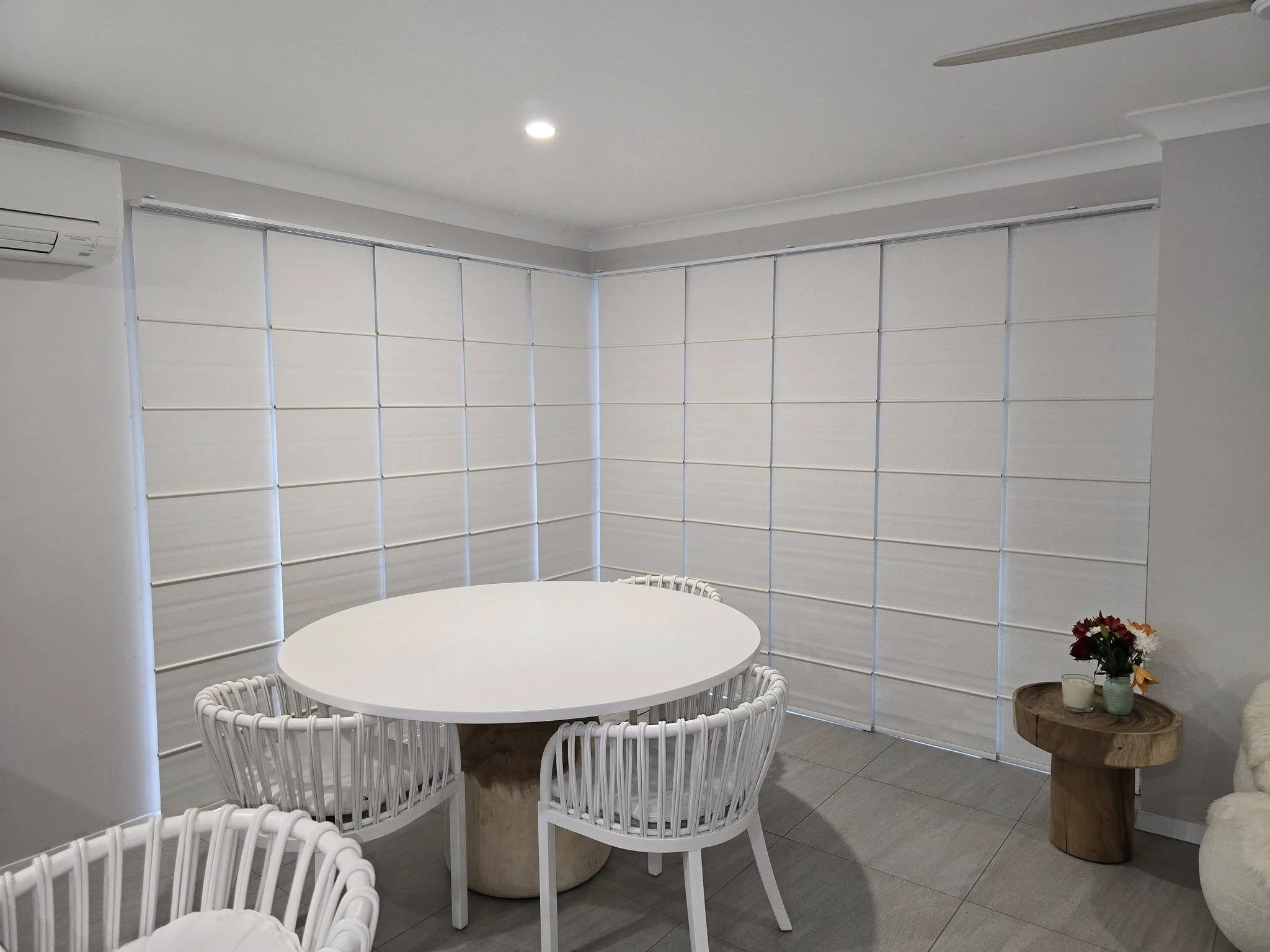 Panel Glide Blinds covering sliding doors in living room