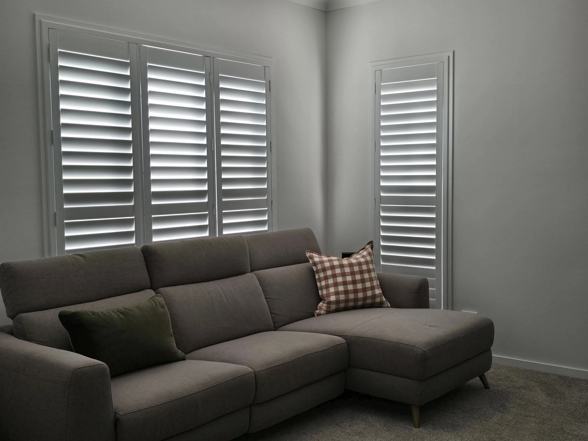 Internal Plantation Shutters behind the couch