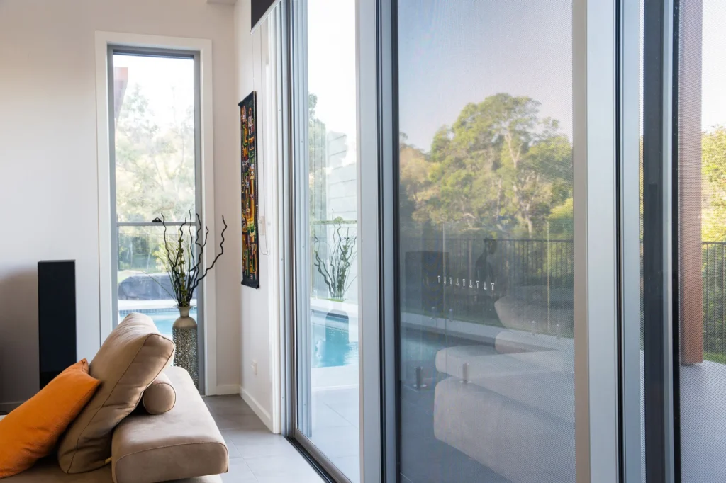 Looking through security screens to the outside pool area
