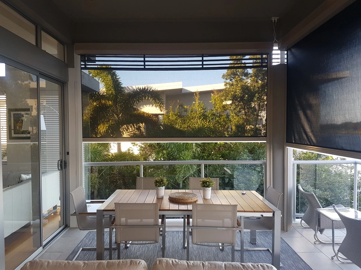 Outdoor roller blinds on balcony
