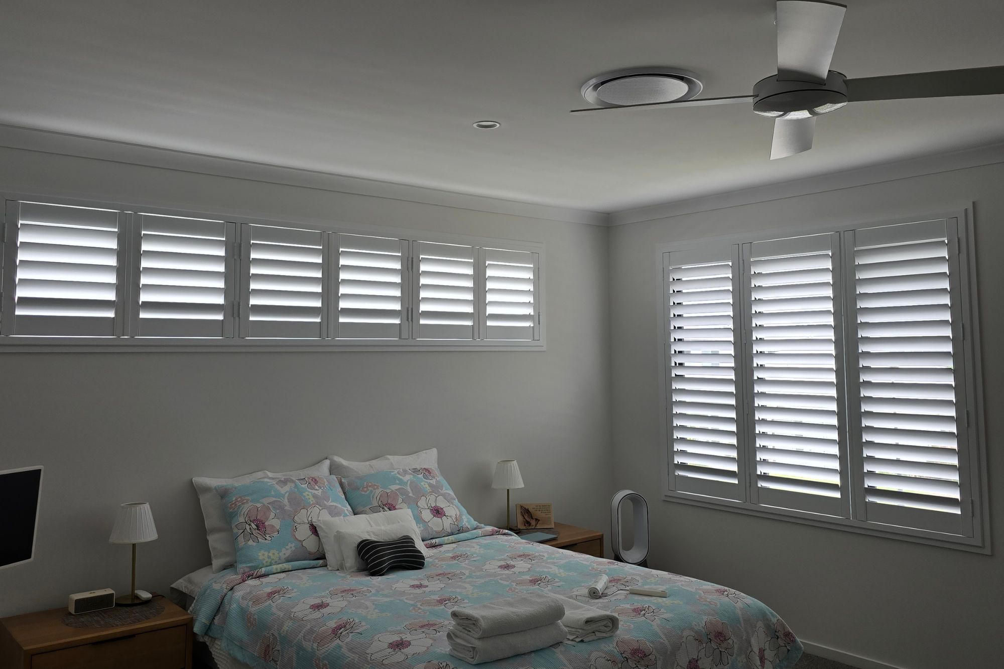 Plantation shutters on bedroom window