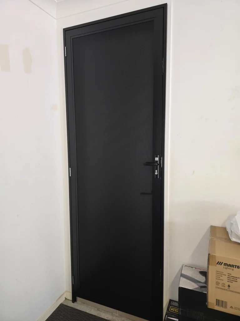Security door installed on garage internal door