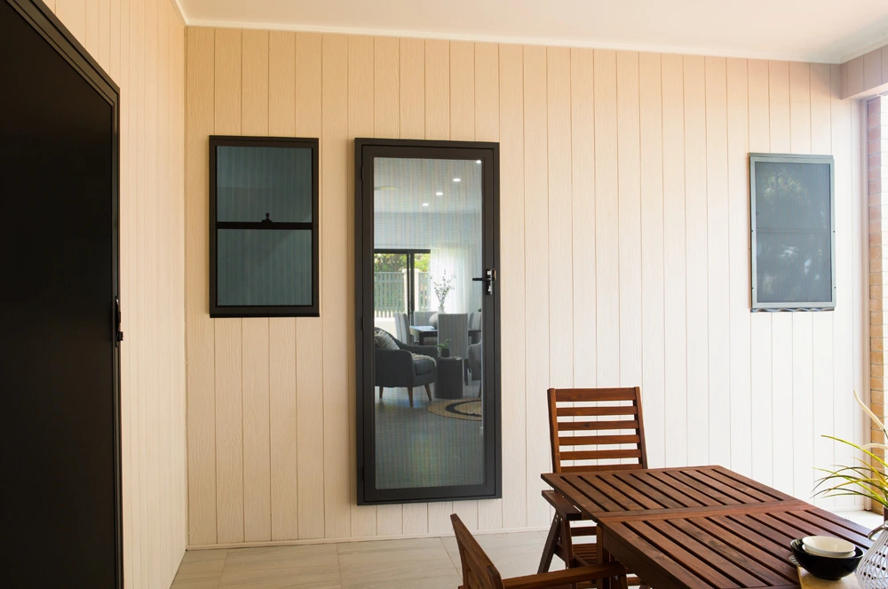 Hinged security door to backyard living area